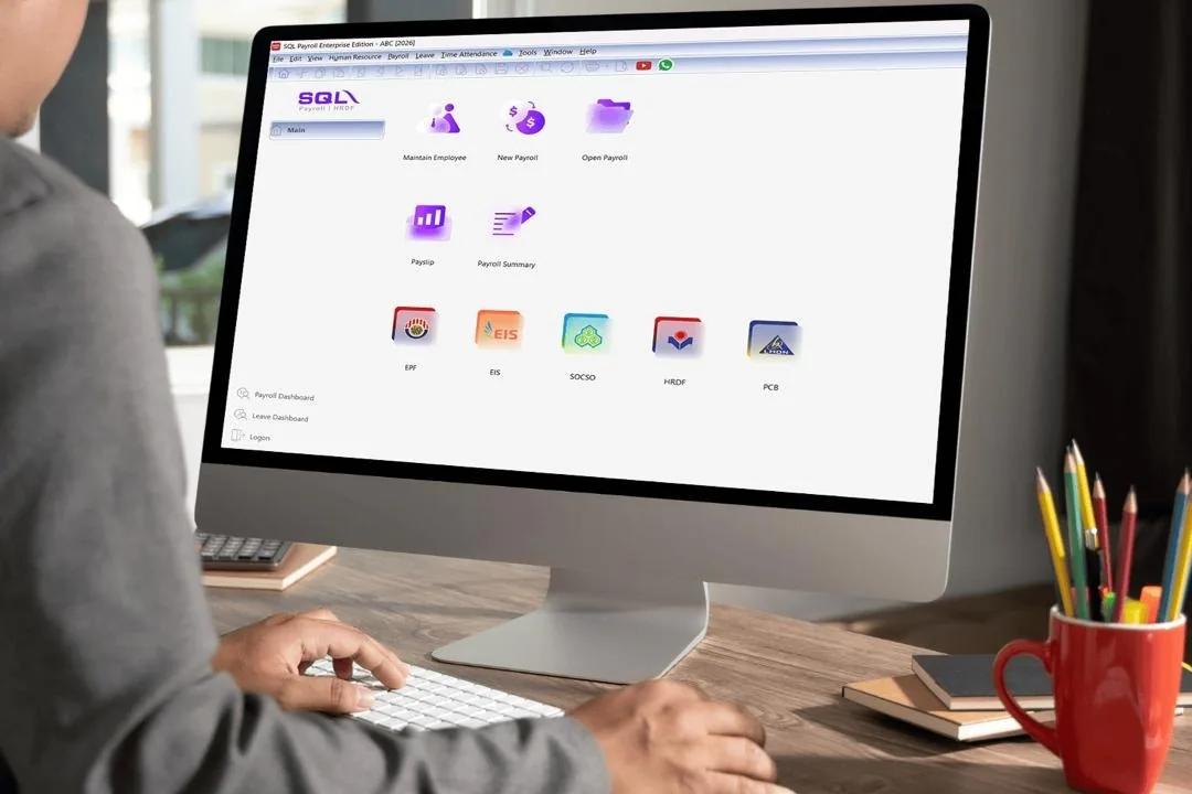 SQL Payroll software on a desktop computer showing Maintain Employee, New Payroll, Payslip, EPF, EIS, SOCSO, HRDF and PCB